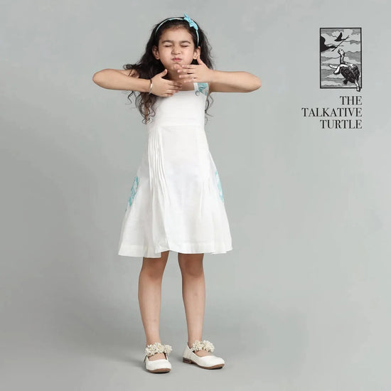 Cotton White Crisscross Back Frock For Girls with The Talkative Turtle Print